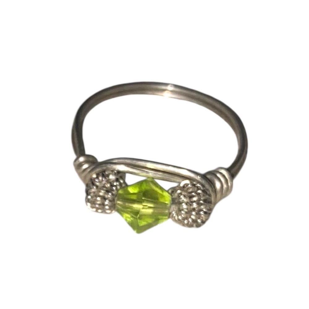 Handcrafted silver wire and Peridot Ring. Size 8
